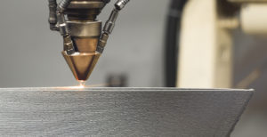 3D metal printer produces a steel part.